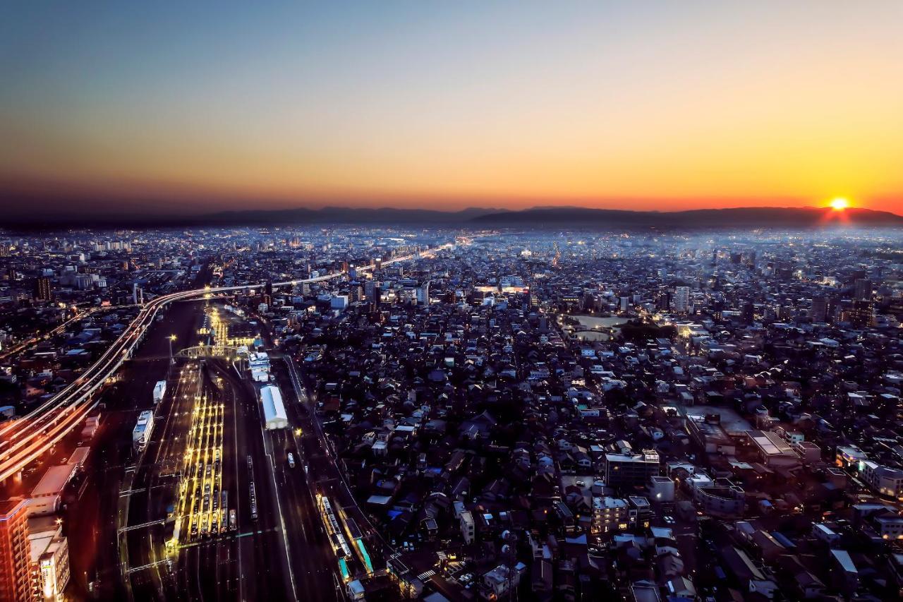 Nagoya Prince Hotel Sky Tower Exterior photo Aerial view of the city at sunset